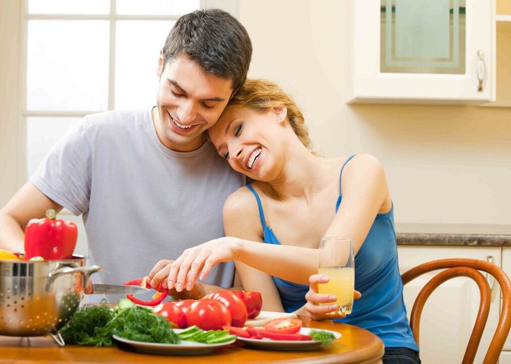 woman and man prepare vegetables to increase potency